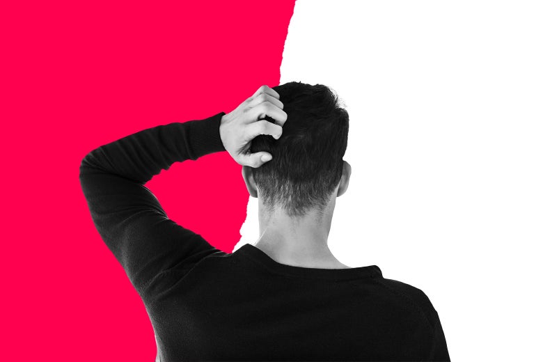 Confused man scratching his head.